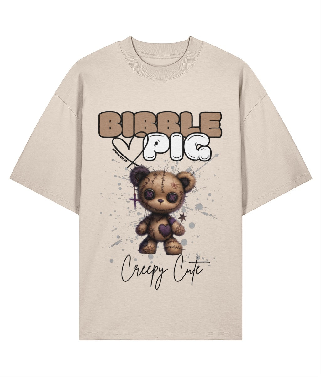 Cream oversized organic t-shirt with voodoo doll style teddy bear and large bibble pig logo.