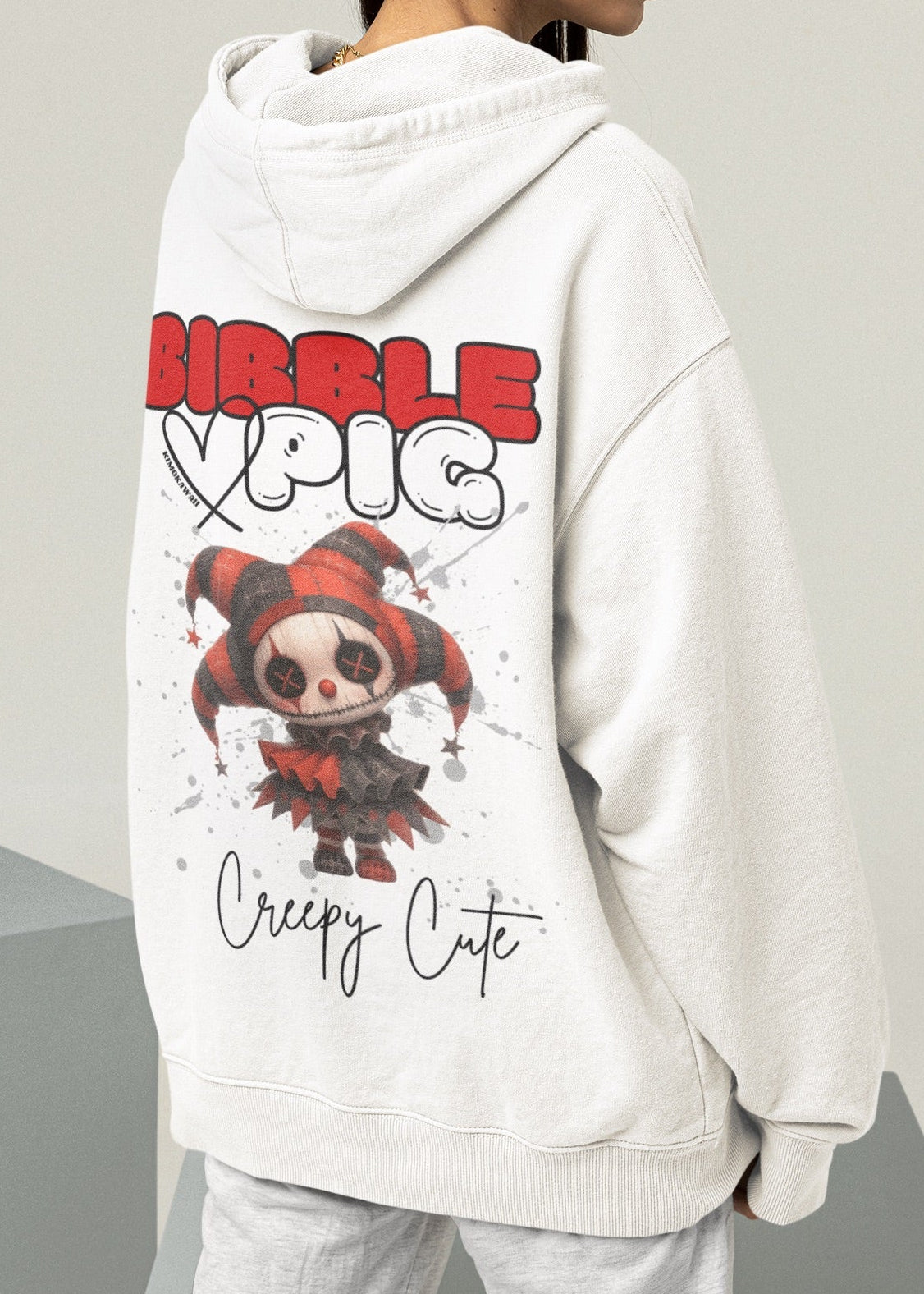 Close up of a model wearing a white organic hoodie featuring goth style creepy cute Luna Jester Voodoo style graphic.  