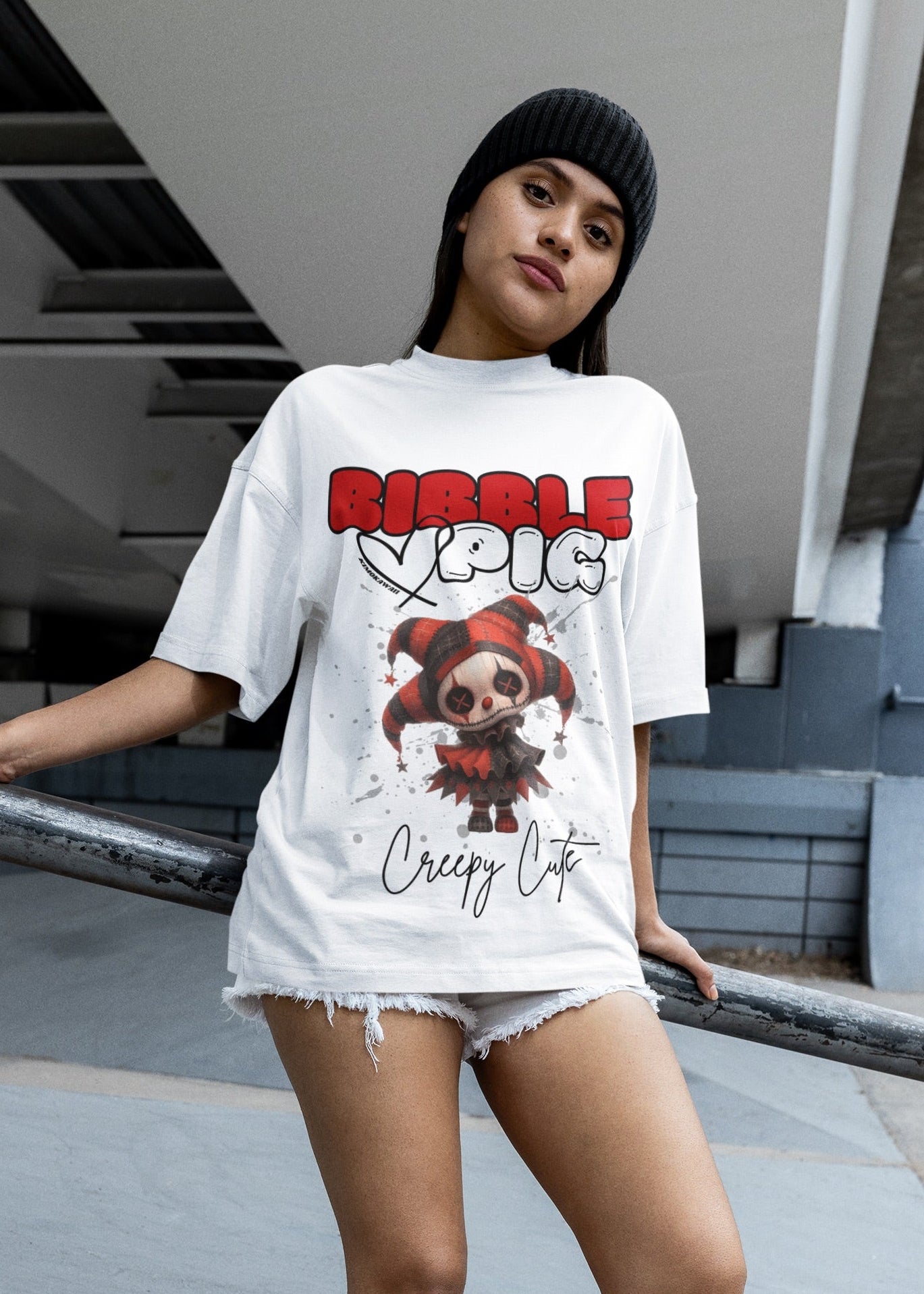 Close up of a model wearing white oversized t-shirt featuring Luna Voodoo doll graphic and bold Bibble Pig Logo.