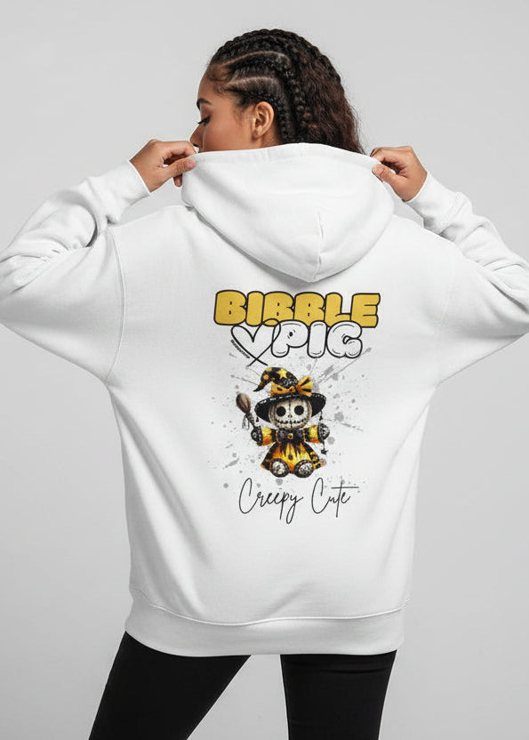 Back view of a white oversized organic hoodie with our Bibble Pig Signature Bold Logo and Creepy Cute Soul Creeper Doll Graphic.